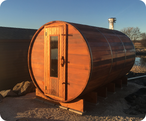 Barrel sauna at night